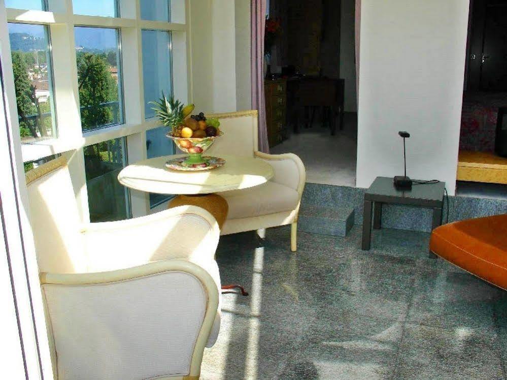 Villa Garni Gardenia Caslano Bagian luar foto